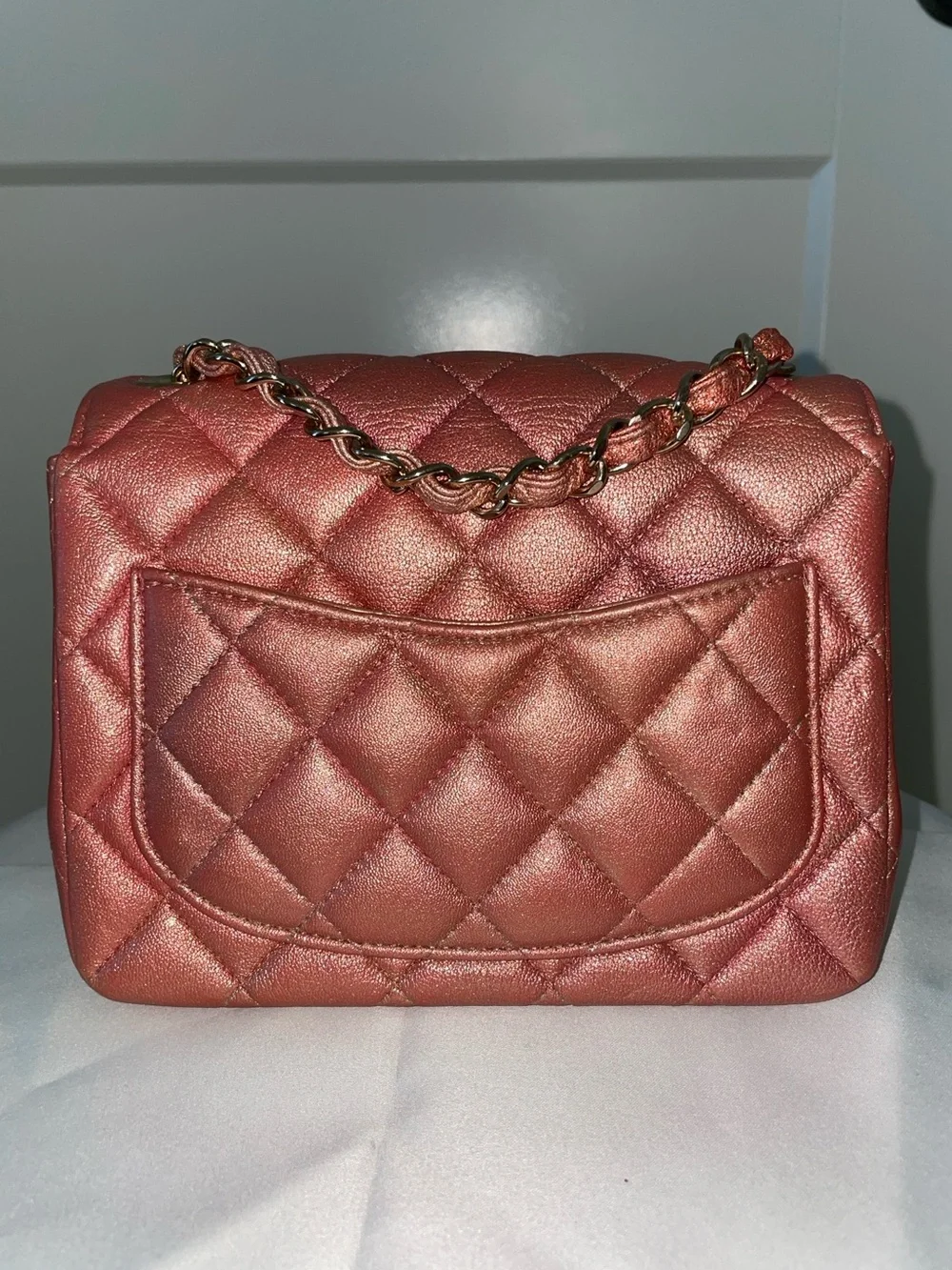 CHANEL Quilted Mini Flap Bag in Metallic Rose